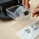 repair robot vacuum latch